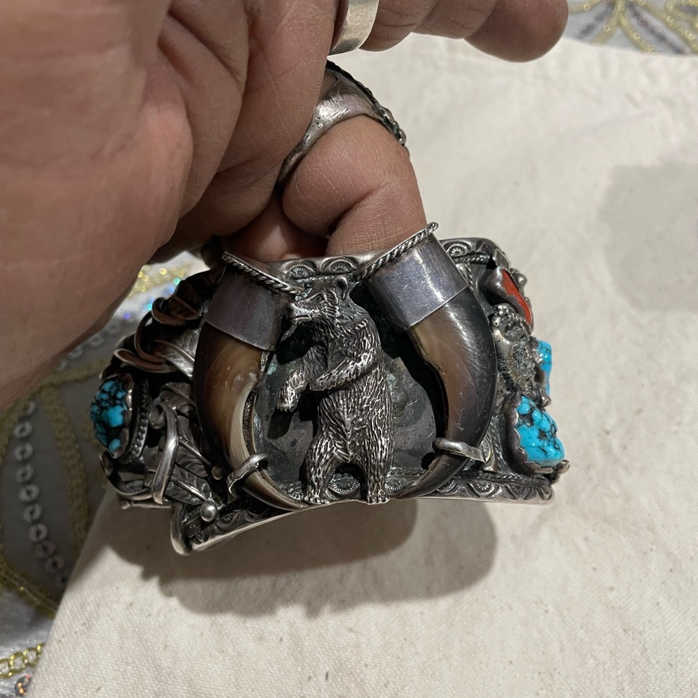 Vintage rare Navajo cuff bracelet with 7 claws and a turquoise and coral